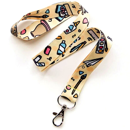 Lanyard: Art Supplies | Teacher ID Badge with Brushes, Sketchpads, Yarn, Paint Palette Icons